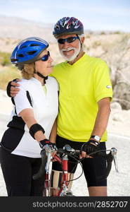 Senior couple with bikes