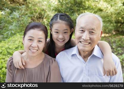 Senior Couple with Granddaughter
