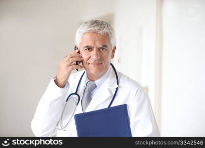 Senior doctor on the phone