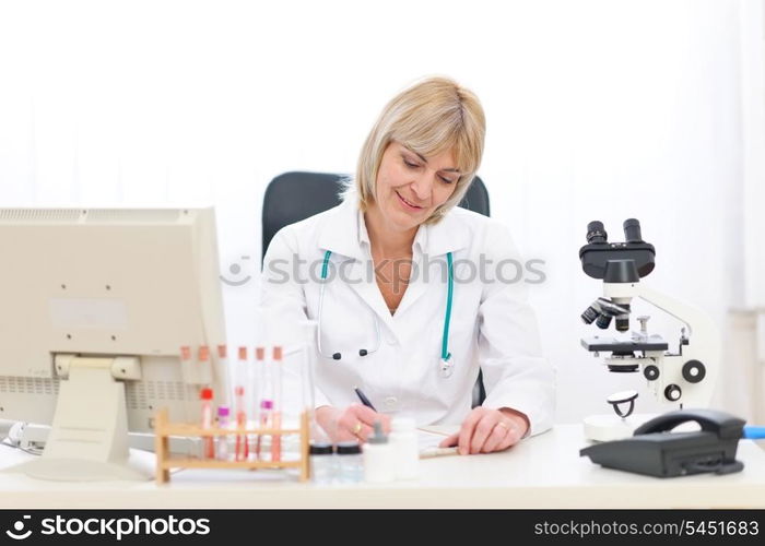 Senior doctor woman working at office