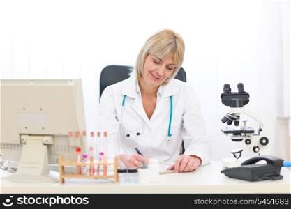 Senior doctor woman working at office