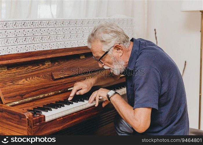 Senior Elderly musician enjoy happy playing music with Piano prevent Alzheimer disease.
