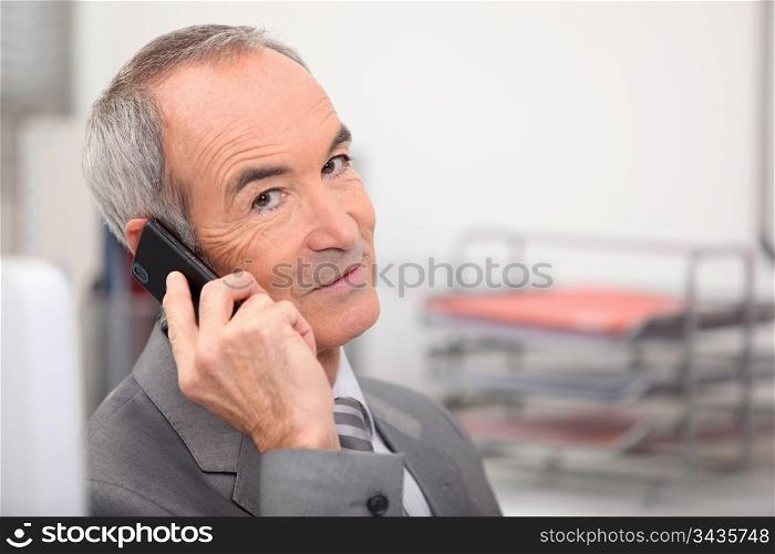 Senior executive on the phone