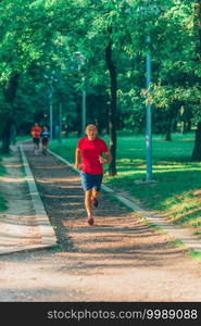 Senior Exercising in Park