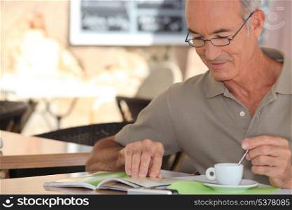 senior having cup of coffee
