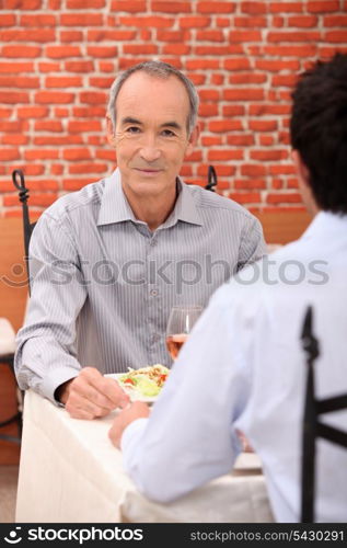 senior in a restaurant