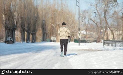 senior jogging in winter