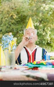 Senior man at a birthday party