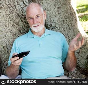 Senior man can&rsquo;t figure out how to text on his new smart phone.