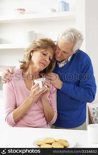 Senior Man Consoling Wife