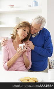 Senior Man Consoling Wife