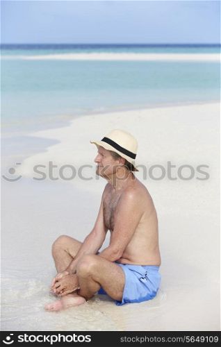 Senior Man Enjoying Beach Holiday