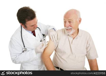 Senior man getting a flu shot from his doctor. Isolated on white.