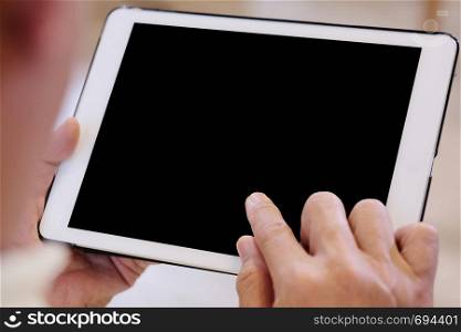 Senior man hand holding tablet with blank on screen display background, senior people and technology display montage, mock up, template, background