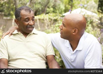 Senior Man Having Serious Conversation Adult Son