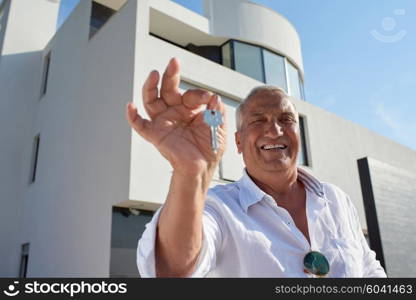 senior man in front of luxury modern home villa