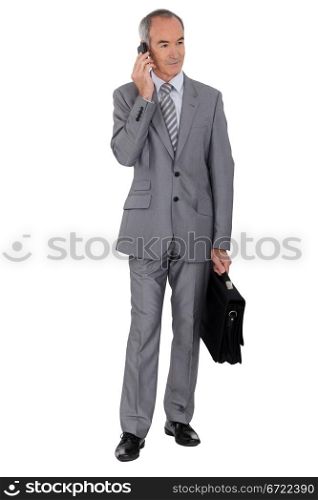 Senior man in suit on white background