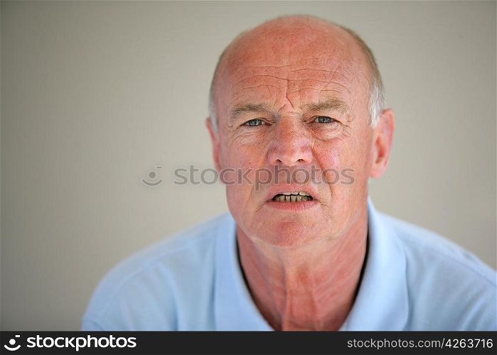 senior man looking confused