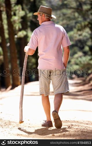 Senior man on country walk