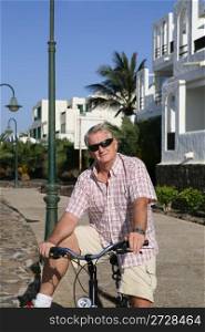 Senior Man On Cycle Ride