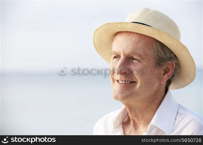Senior Man On Tropical Beach Holiday