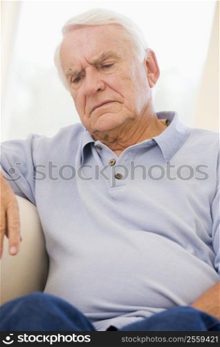 Senior Man Sitting On Couch