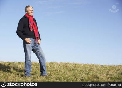 Senior Man Standing In Park