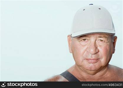 Senior man wearing a baseball cap