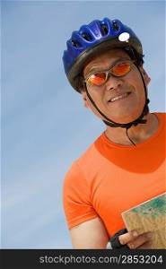 Senior man wearing cycling helmet