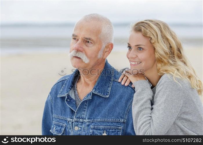 senior man with adult daughter