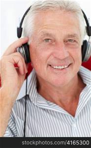 Senior man with headphones