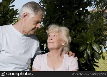 Senior man with his arm around a senior woman