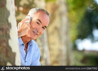 Senior man with telephone