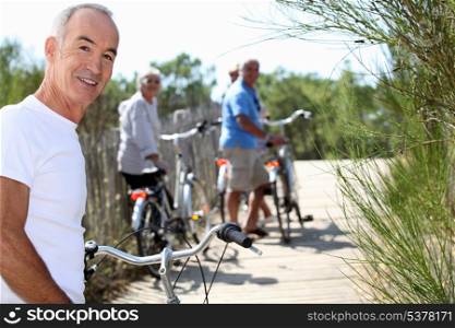 senior men and women riding bicycles