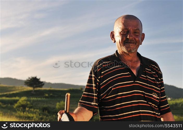 senior old man portrait outdoor at sunset