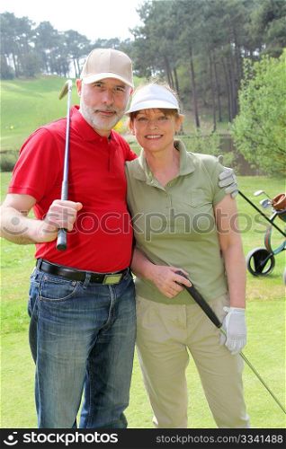 Senior people on golf course