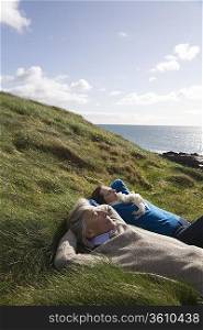 Senior relaxing in scenic coastal landscape