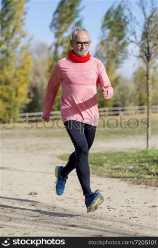 Senior runner while training for a competition