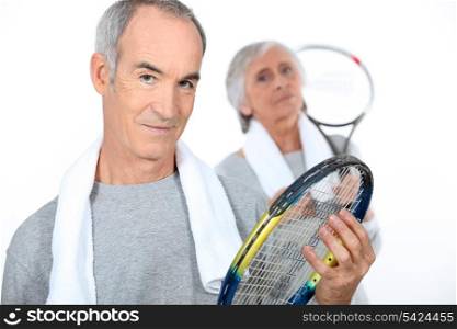 Senior tennis couple