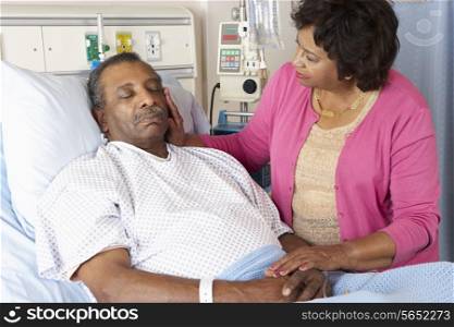 Senior Wife Visiting Husband On Ward