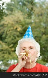 Senior woman at a birthday party