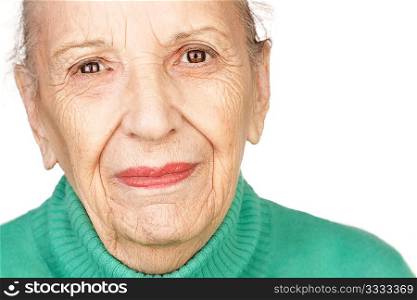 senior woman close-up on white background, selective focus