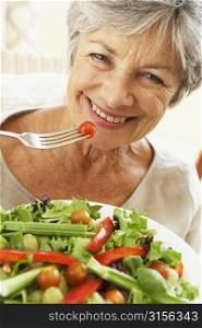 Senior Woman Eating Healthy Salad