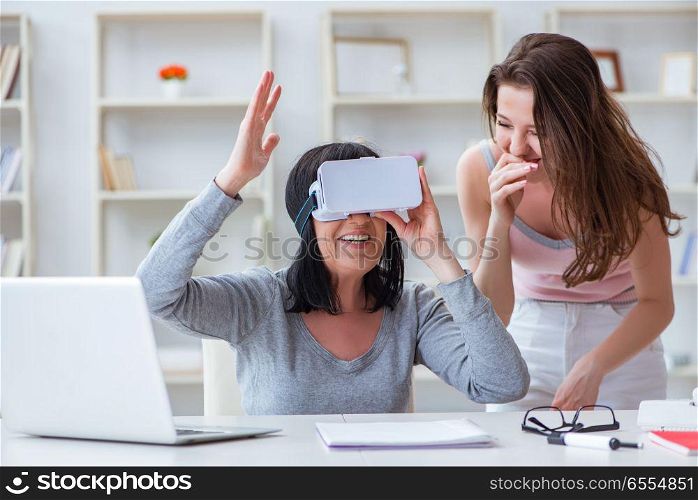 Senior woman experiencing virtual reality glasses