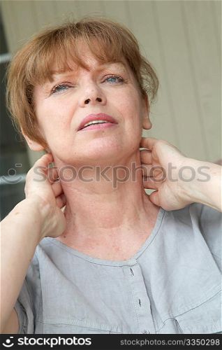 Senior woman having a headache