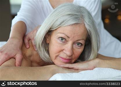 Senior woman having a massage