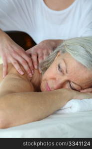 Senior woman having a massage
