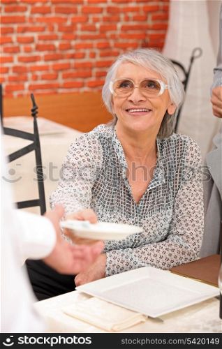 senior woman in a lovely restaurant