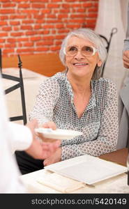 senior woman in a lovely restaurant