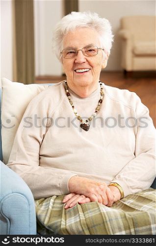 Senior Woman In Chair At Home